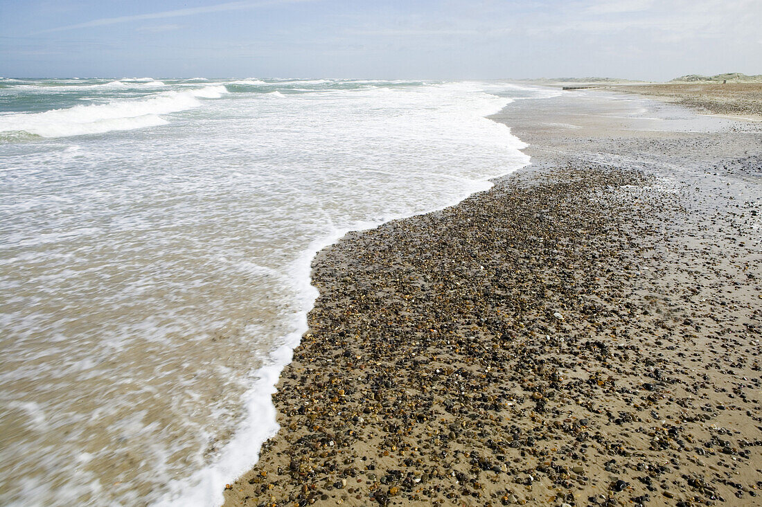 Waves and small stones in the water´s edge, Skagerrak, Jutland, Denmark