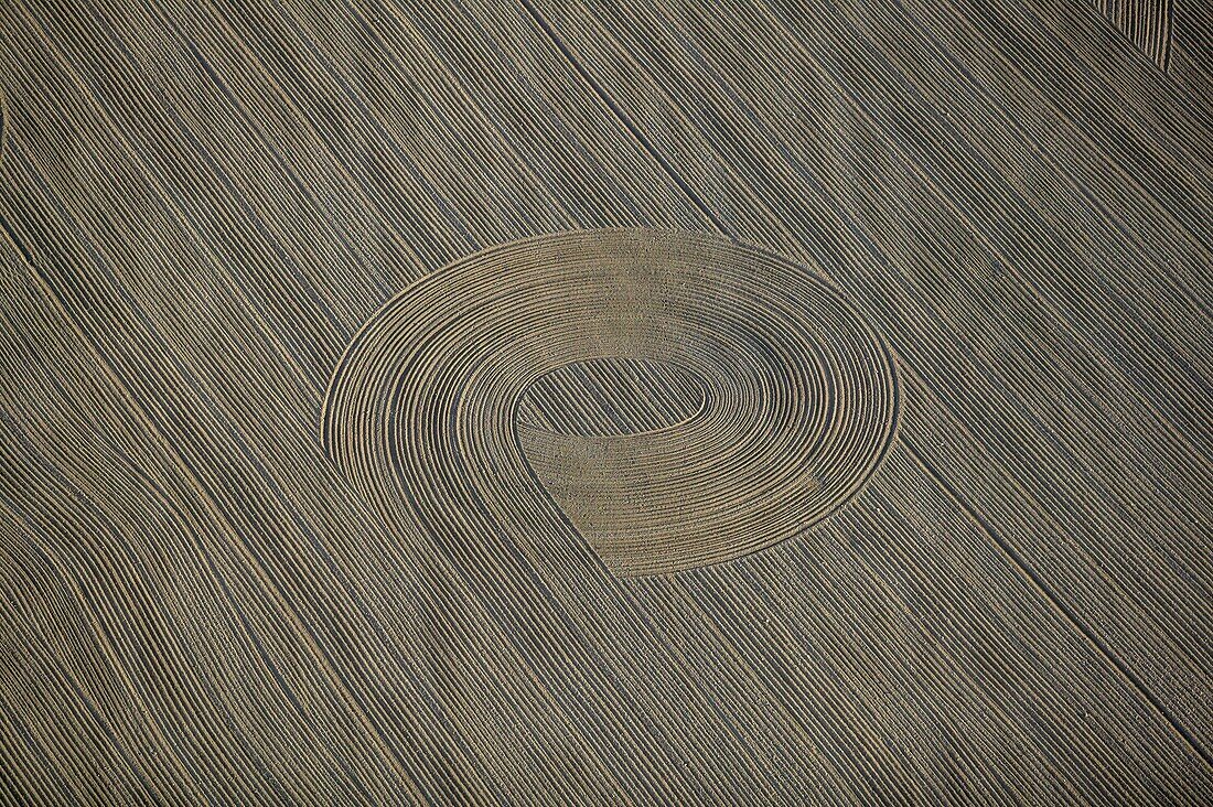Wheel tracks from a tractor on a field