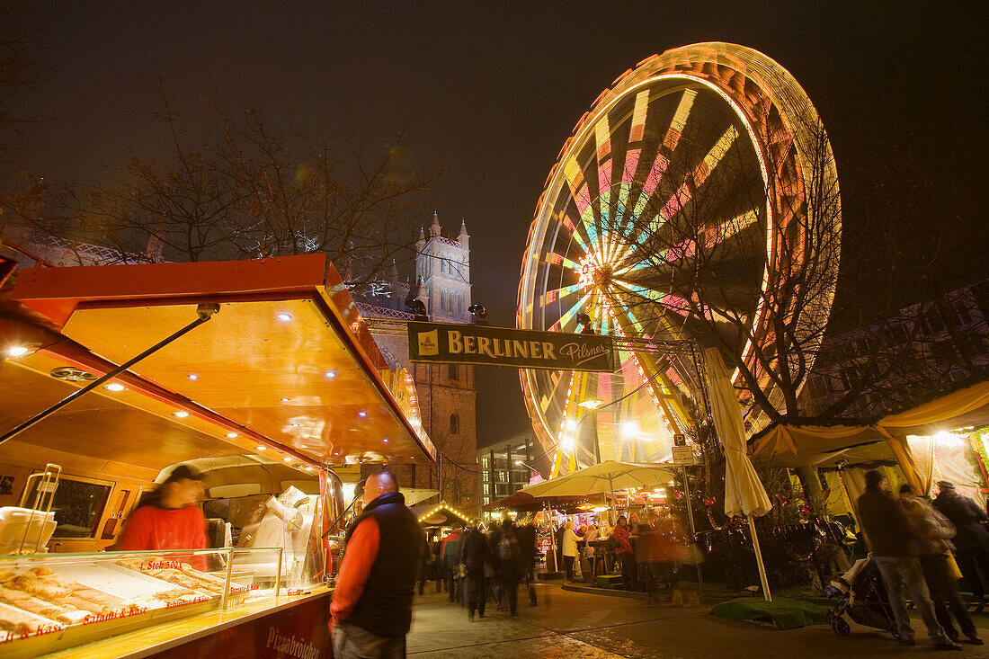 Opera Palace Christmas market and Friedrich Werdersche Church in background, Berlin, Germany