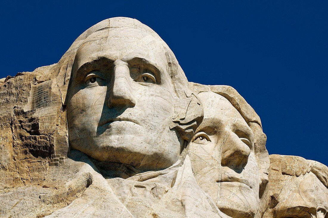 Faces of Presidents George Washington and Thomas Jefferson, Mount Rushmore National Memorial, Black Hills, South Dakota USA