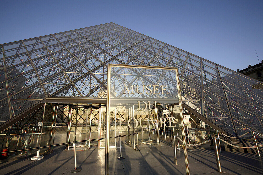 Glass pyramid entrance to the Louvre Museum, Paris. France