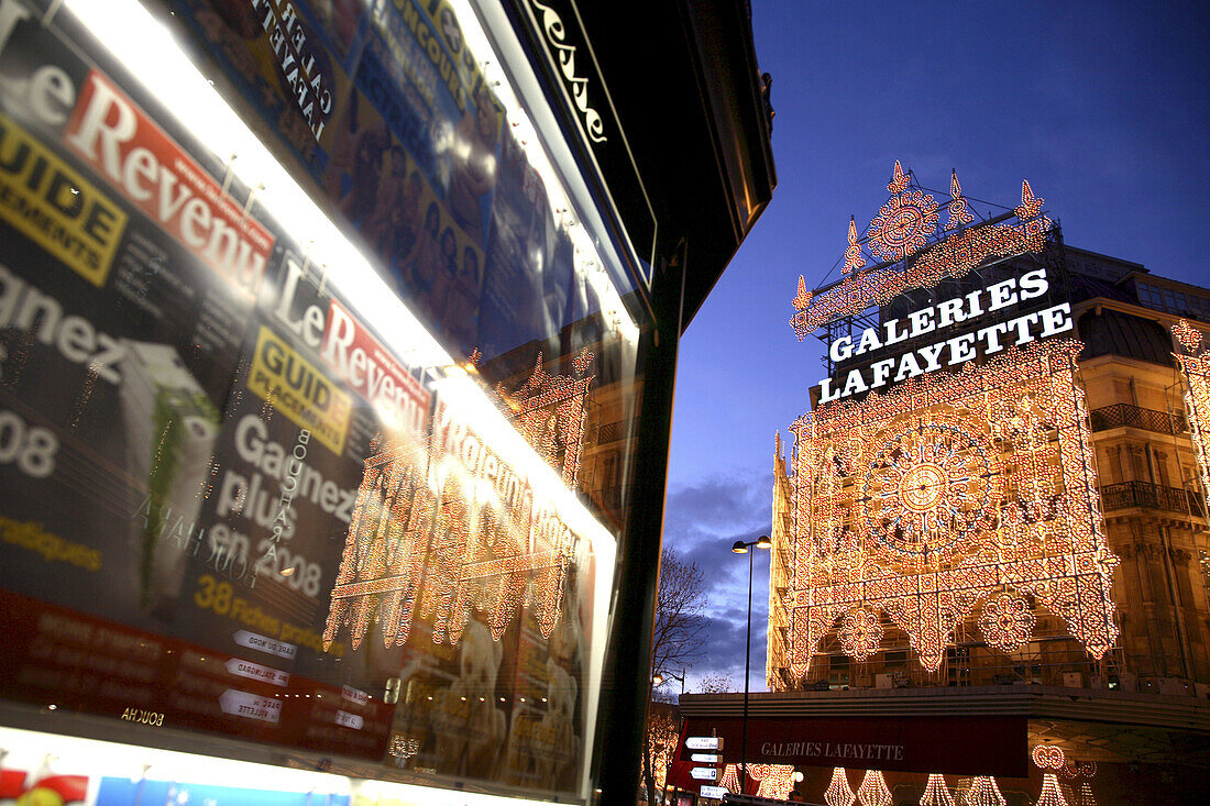 Night view of Galeries Lafayette with Christmas lights decoration, Paris. France