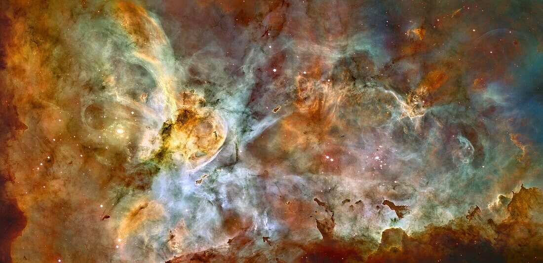 What dark forms lurk in the mists of the Carina Nebula These ominous figures are actually molecular clouds, knots of molecular gas and dust so thick they have become opaque  In comparison, however, these clouds are typically much less dense than Earth´s a