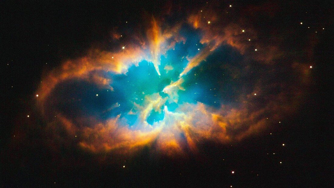 The unique planetary nebula NGC 2818 is nested inside the open star cluster NGC 2818A  Both the cluster and the nebula reside over 10,000 light-years away, in the southern constellation Pyxis the Compass   NGC 2818 is one of very few planetary nebulae in