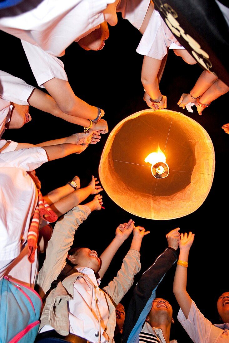 People lightning lanterns during Loi Krathong festival in Chiang Mai Thailand