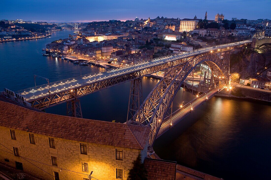 Night view of Oporto city and the Dom Luis I bridge over the Douro river, from Vila Nova de Gaia  World Heritage  Porto, Portugal