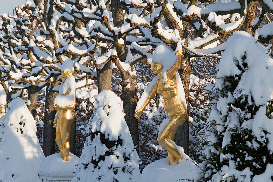 Herrenhausen Garten, golden statues in the winter snow, open air theatre, Hanover, Lower Saxony, Germany