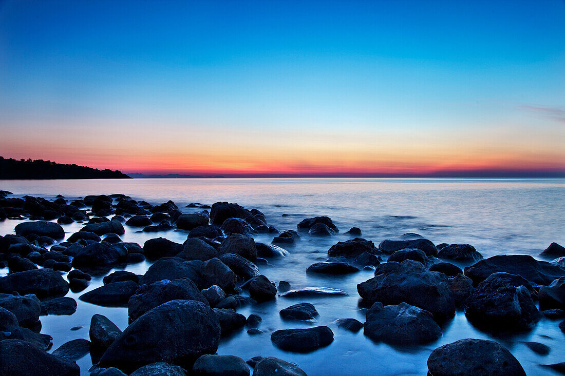 Rocks in sea at night, Cefalú, Palermo, Sicily, Italy