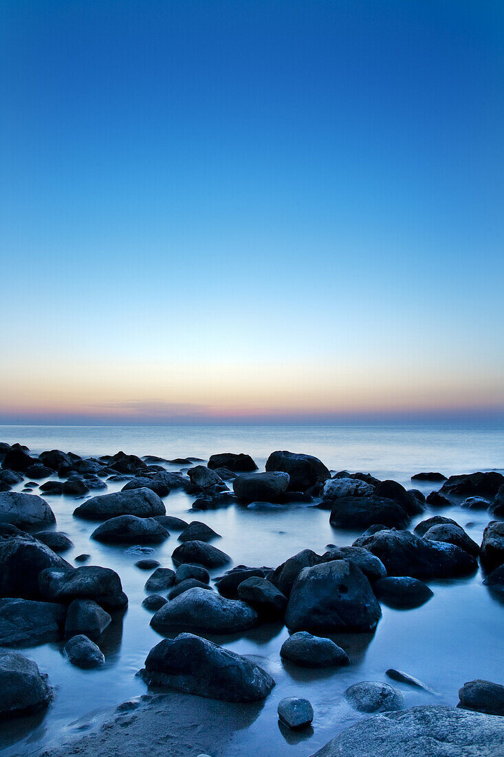 Rocks in sea at night, Cefalú, Palermo, Sicily, Italy