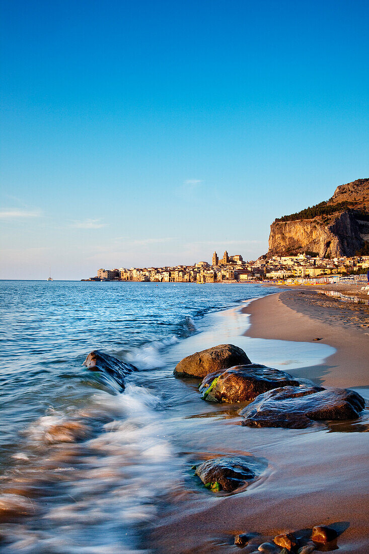 Beach, old town, cathedral and cliff La Rocca, Cefalú, Palermo, Sicily, Italy