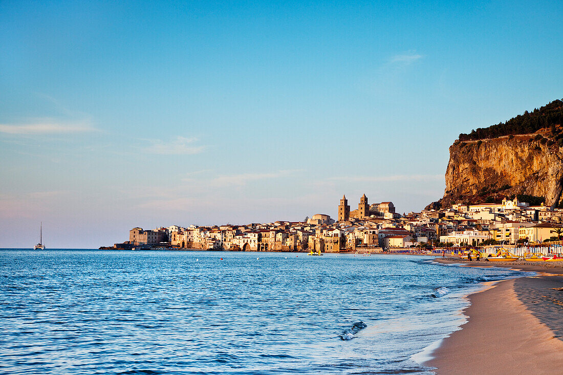 Beach, old town, cathedral and cliff La Rocca, Cefalú, Palermo, Sicily, Italy