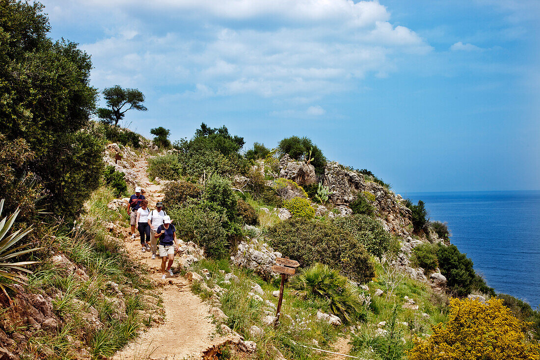 Hiker at Zingaro nature reserve, Sicily, Italy