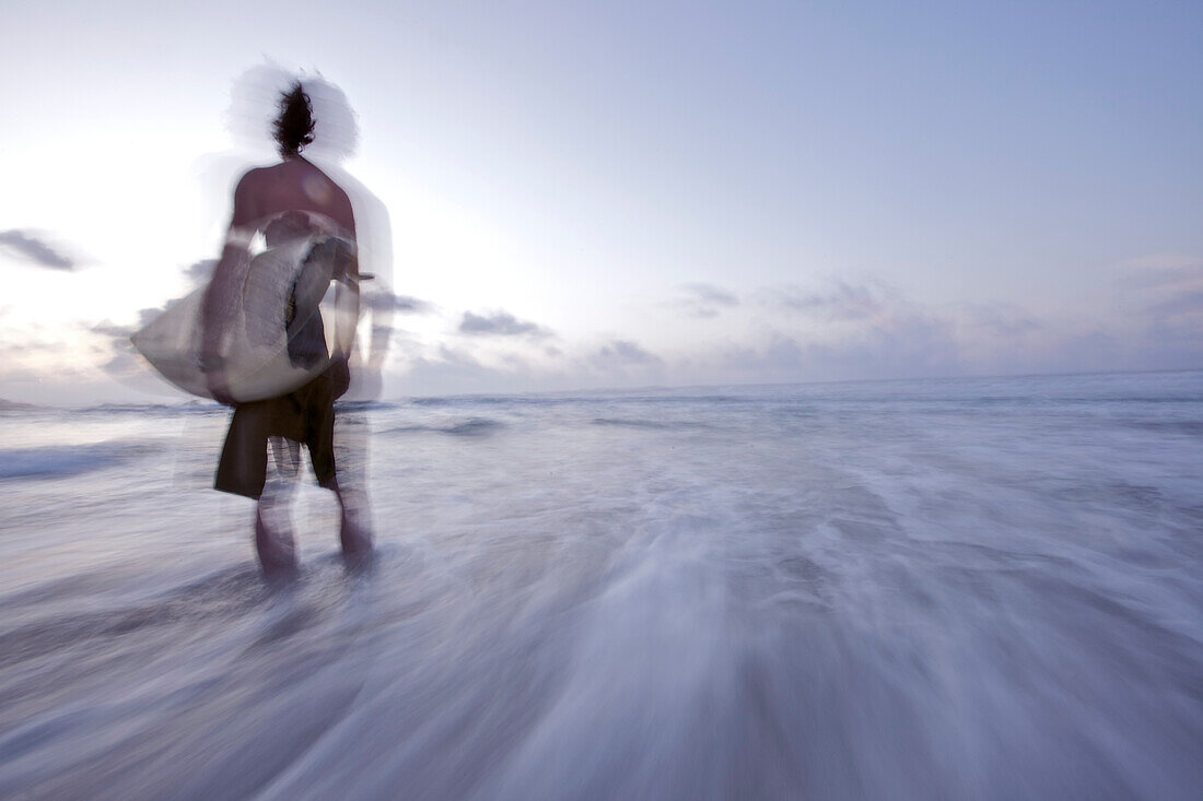 Surfer at beach, Istmo de la Pared, Fuerteventura, Spain