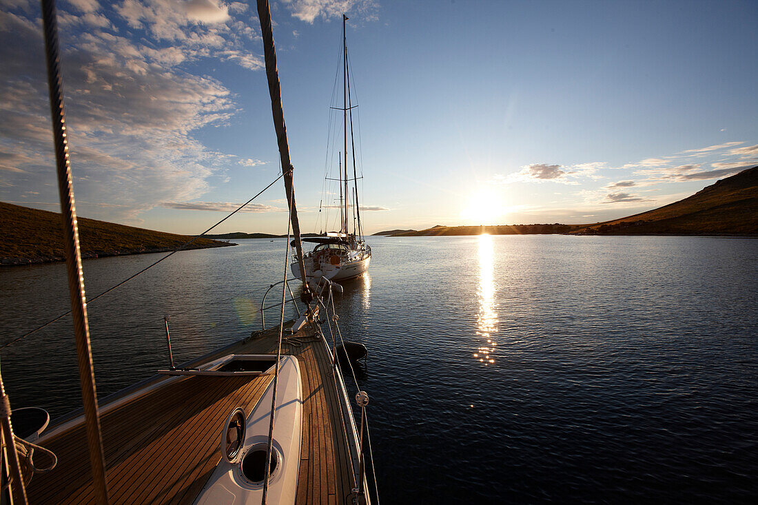 Sailing boat in a bay at sunset, Kornati archipelago, Croatia, Europe