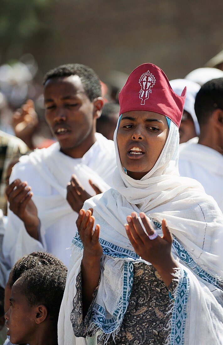 Ethiopia, Lalibela,Timkat festival, Singing devotees  Every year on january 19, Timkat marks the Ethiopian Orthodox celebration of the Epiphany  The festival reenacts the baptism of Jesus in the Jordan River  Wrapped in rich cloth, the church Tabots repli