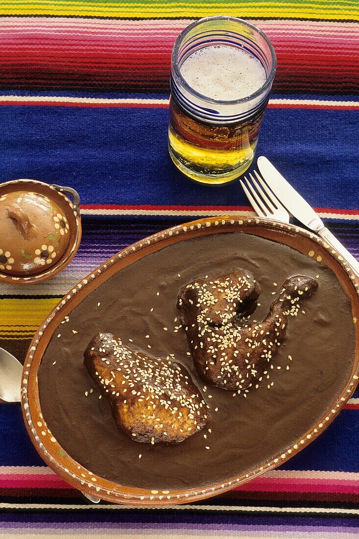 The Mexican dish, Chicken with Mole Poblano, a thick, chocolate-tinged sauce