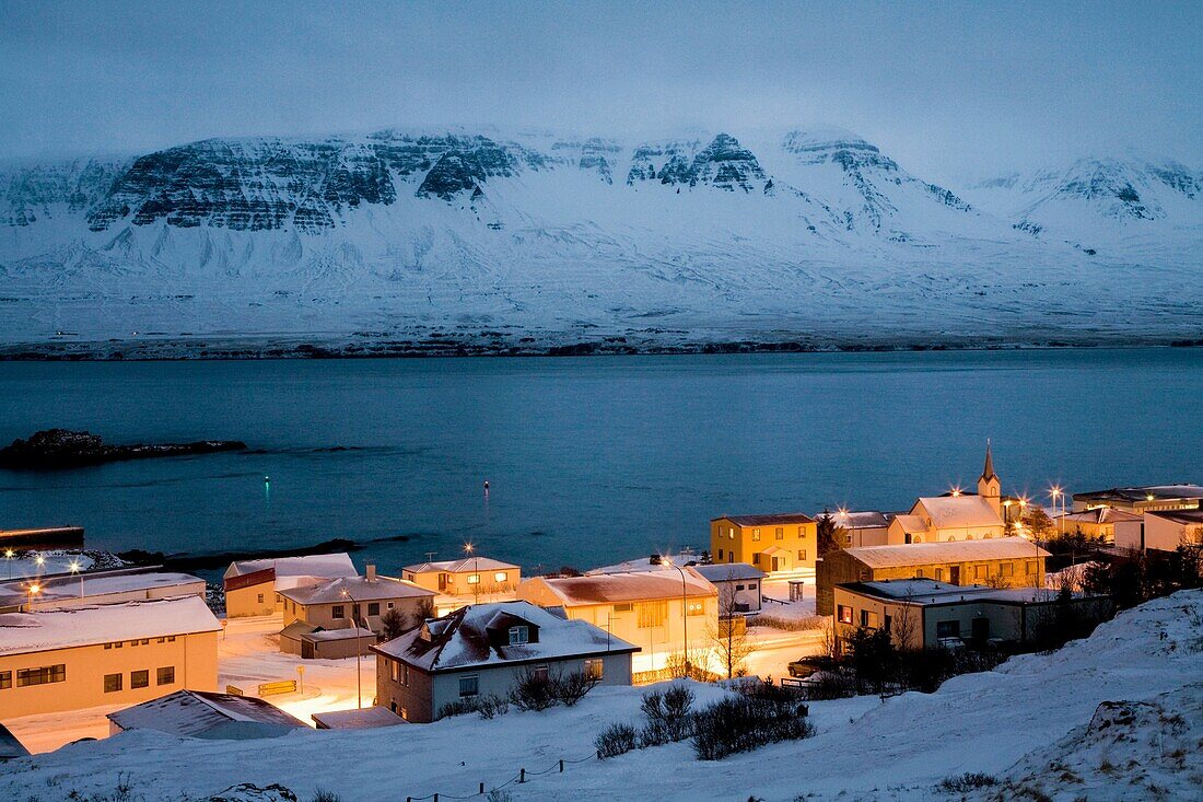 View over Vopnafjordur at dusk during winter, East Iceland  Vopnafjordur hopes to service the oil industry if oil is found underwater in the Dreki area, which is east of Iceland