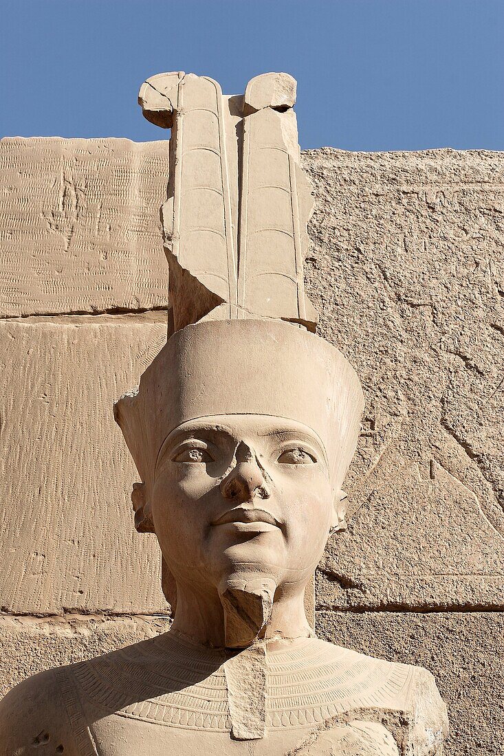 An ancient stone bust of an Egyptian Pharoah