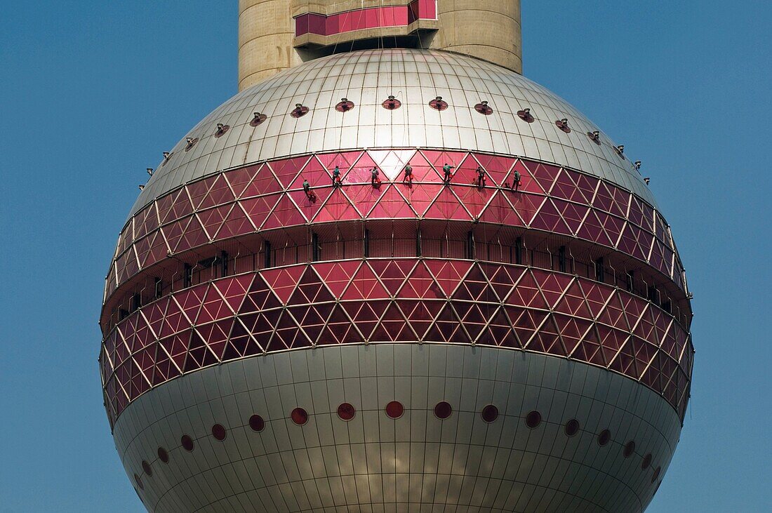 Window washers on the Oriental Pearl Tower Shanghai China