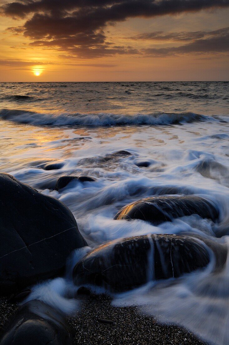 Sunset at the beach at Westward Ho! on the North Devon coast, England, United Kingdom
