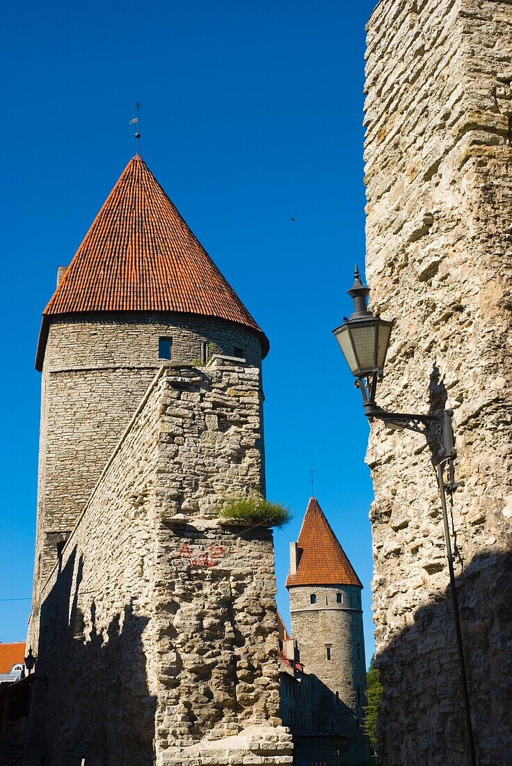 Towers and defensive wall in the old town of Tallinn Estonia Europe