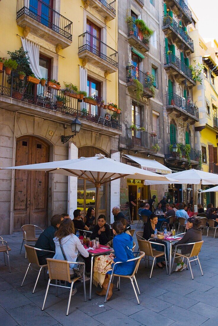 People at the terrace of a tapas restaurant in Ribera district of central Barcelona Spain Europe