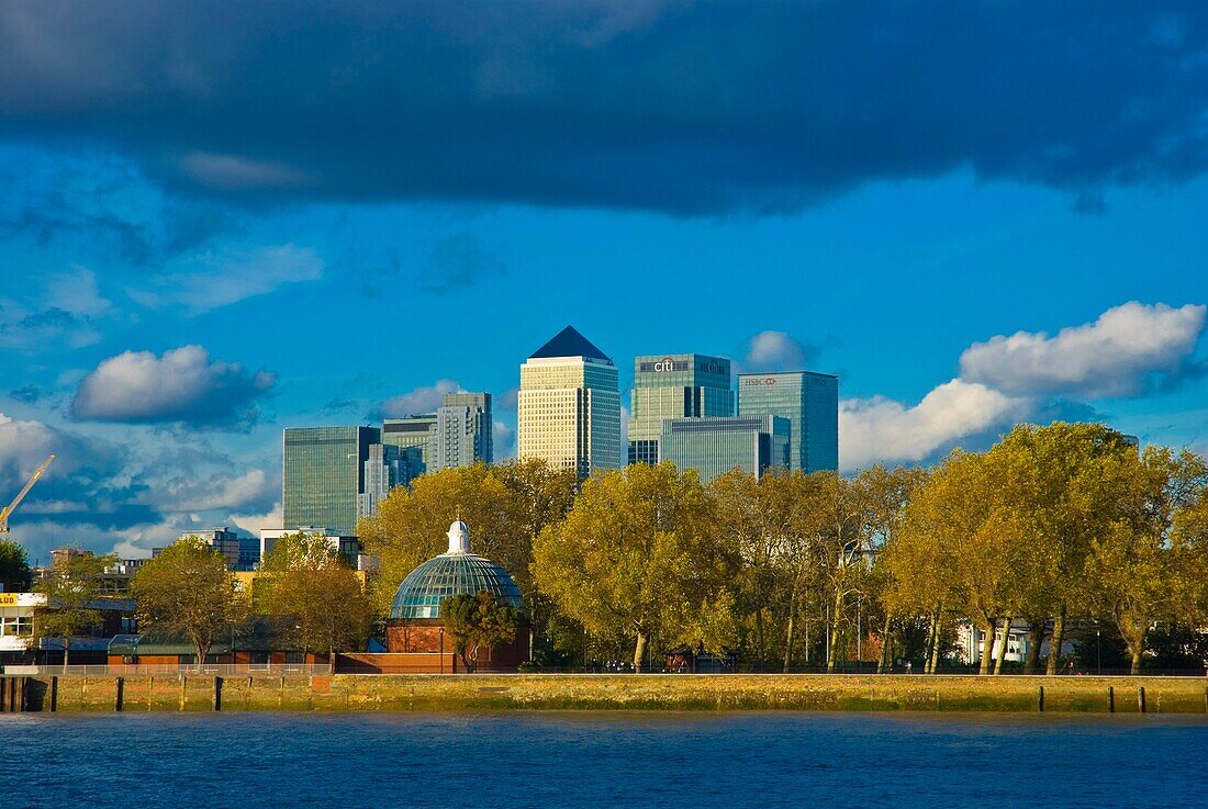 Island Gardens with buildings of Canary Wharf in background Isle of Dogs east London England UK Europe
