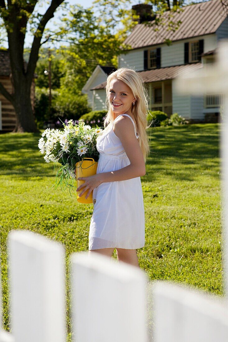 one young woman with flowers