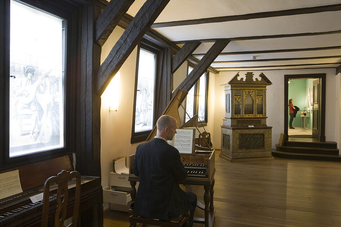 Music presentation in Instrument Hall of Bachhaus Museum, birthplace of Johann Sebastian Bach, Eisenach, Thuringia, Germany, Europe