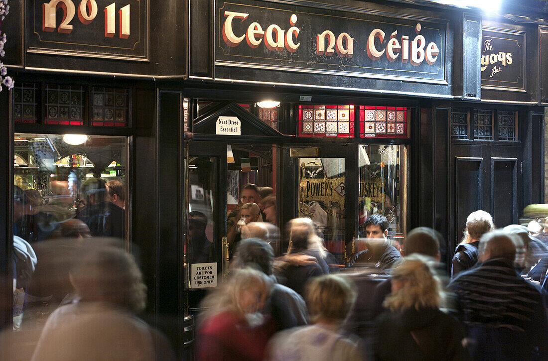 Passers-by and visitors in front of an Irish pub, Fleet Street, Temple Bar area, Dublin, County Dublin, Ireland
