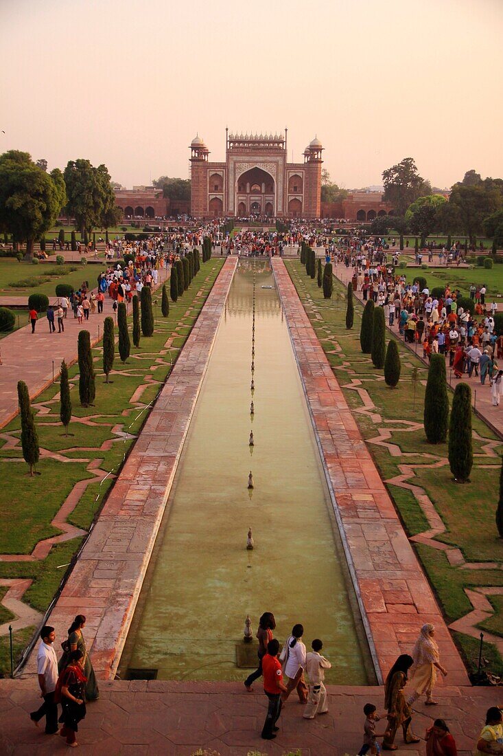 A view from the Taj Mahal looking southward across the reflecting pool toward the main entrance gate. Agra, India