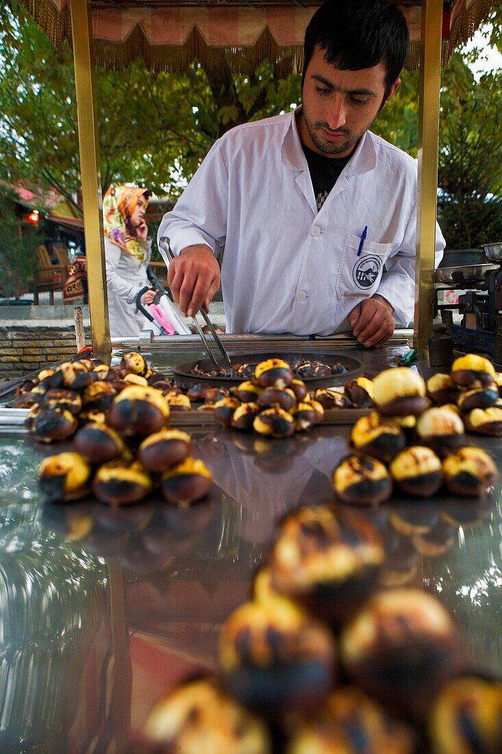 Roasted chestnuts stall in Hamidiye street, Eminonu, Istanbul, Turkey