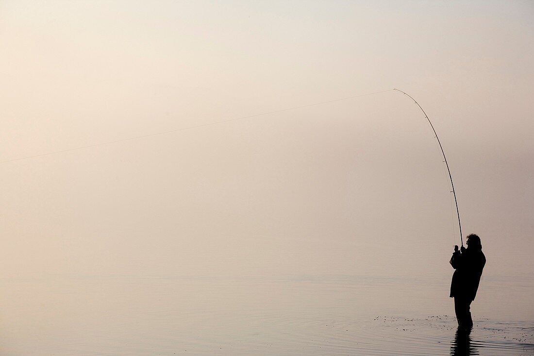 Fisherman at Bassenthwaite Lake, Cumbria, England