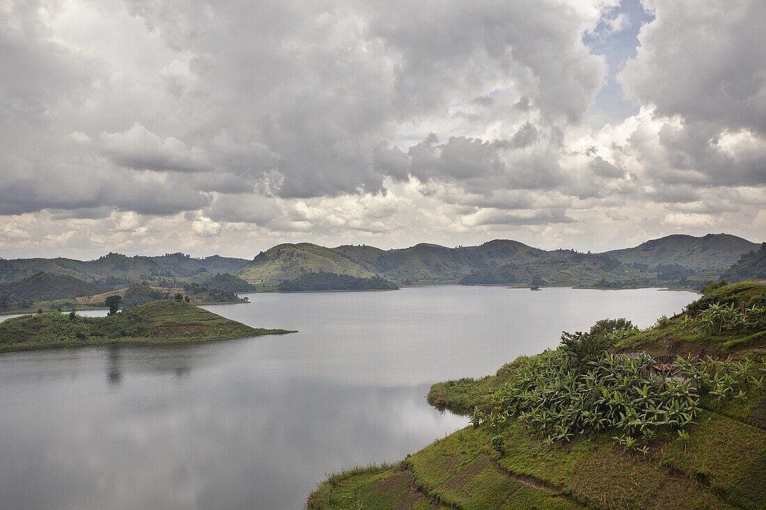 Lake Mutanda near Kisoro with the Virunga Vulcanoes as reflection in the lake    Africa, East Africa, Uganda, Kigezi, Kisoro, February 2009