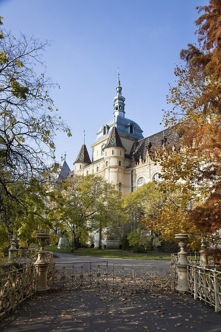Vajdahunyad Castle in Budapest during fall  The Castle was finished in 1896 and is a blend of different architectural styles and epochs of Hungary  Architect and master-builder was Ignac Alpar  Big parts of the building have been buildt having the castle