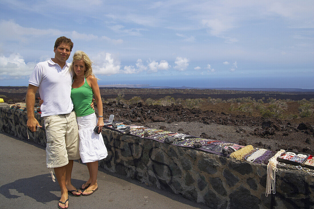 Young couple posing at a wall, Big Island, Hawaii, USA, America