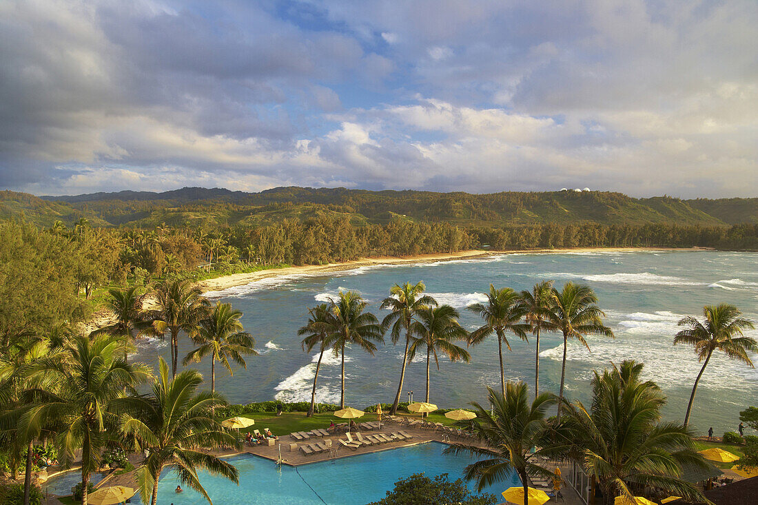 Pool under palm trees at the coast in the evening, North Shore, Turtle Bay, Oahu, Hawaii, USA, America