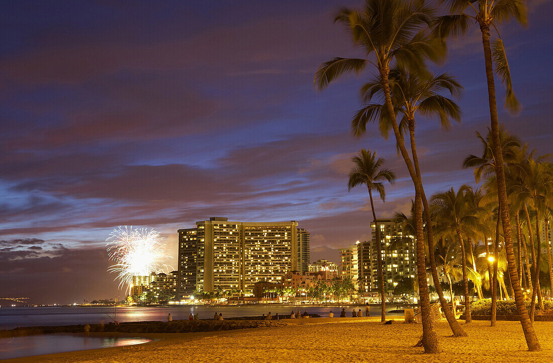 Illuminated hotels and fireworks in the evening, Waikiki Beach, Honolulu, Oahu, Hawaii, USA, America