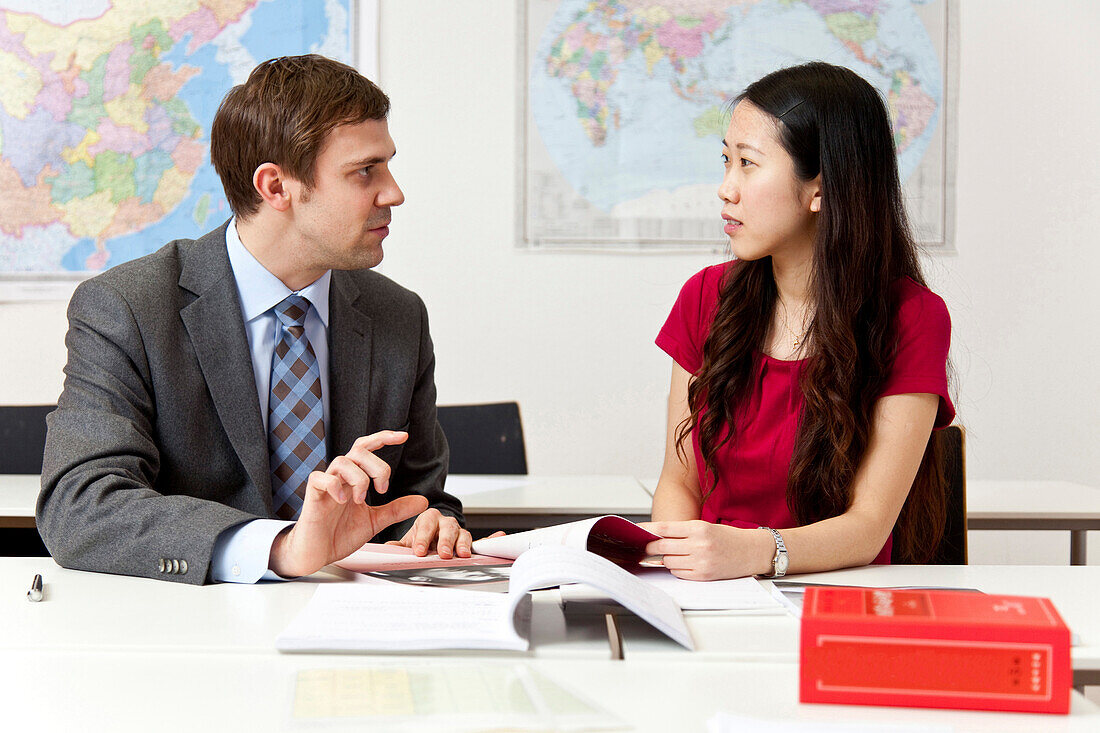 Chinese teacher and German businessman, Confucius Institute Leipzig, Leipzig, Saxony, Germany