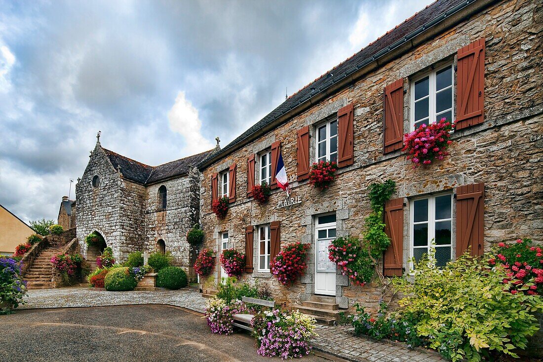 Town Hall right and Chapel left, town of La Vraie Croix, departament of Morbihan, region of Brittany, France