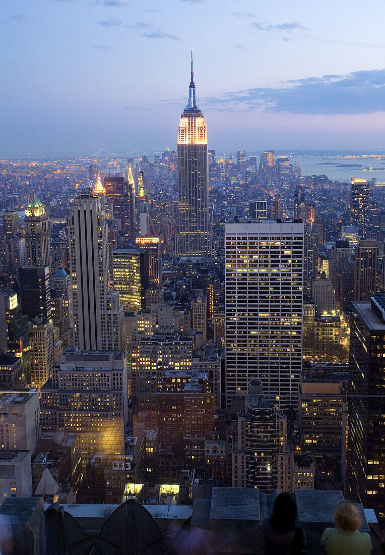 Sunset view of Empire State Building and New York City, USA