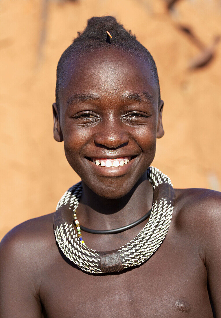 Himba boy, Opuwo, Kaokoland, Namibia.