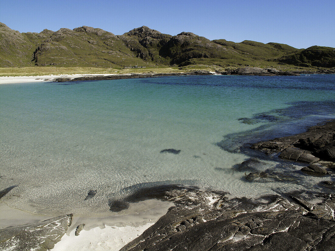 Clear blue water at the beach at Sanna Bay on the Ardnamurchan peninsula in Scotland