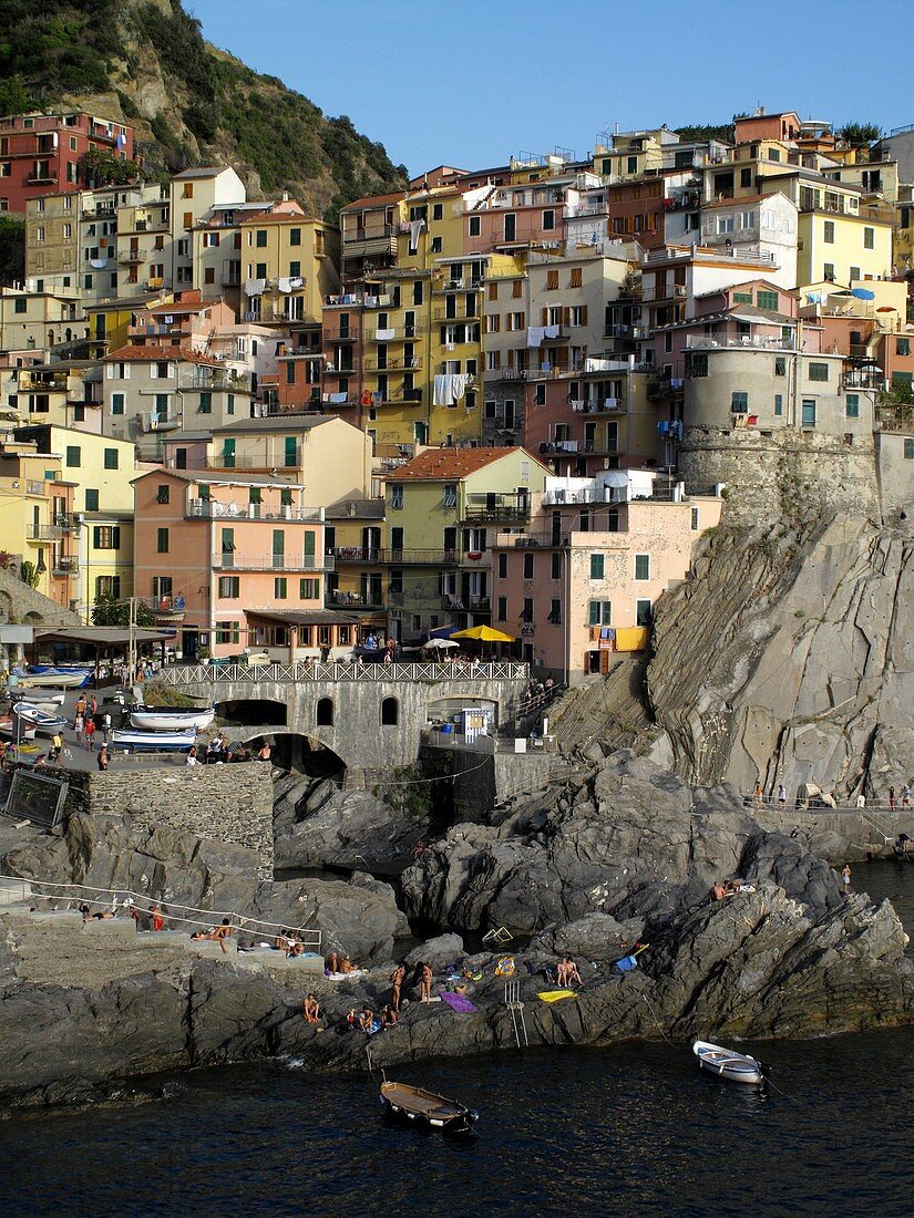 General view of cliffside town and harbour of Manarola in the Cinque Terre region of the Italian Riviera or Riviera di Levanto