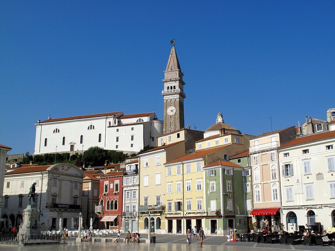 The main square of Piran in southern Slovenia with the Church of St George above