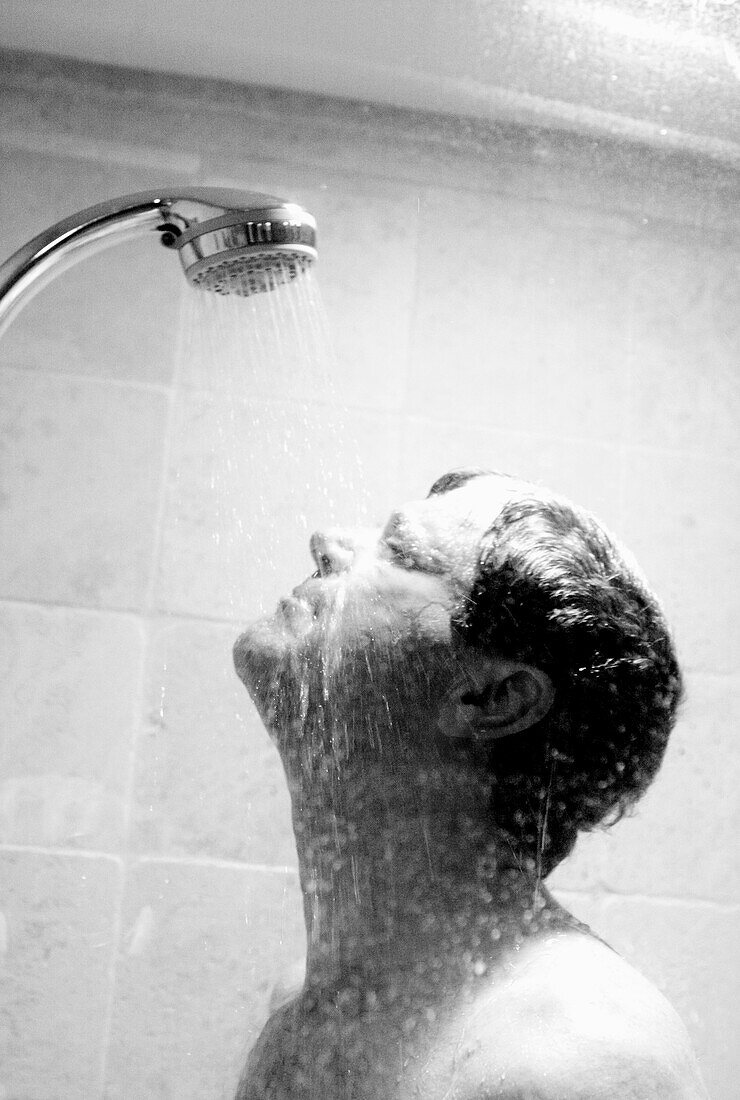 man in shower BW