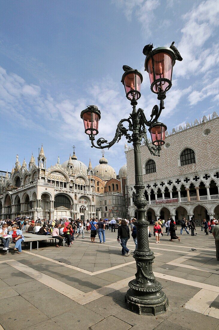 Venetian streetlight  Palazzo Ducale and San Marco Basilic is in the background  Piazzetta San Marco, Venice, Italy, Europe, UNESCO World Heritage