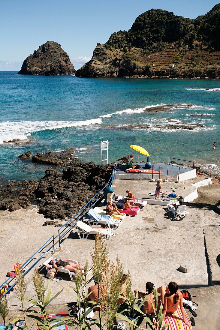 Sunbathing in Sao Lourenço Bay  Santa Maria island, Azores islands, Portugal