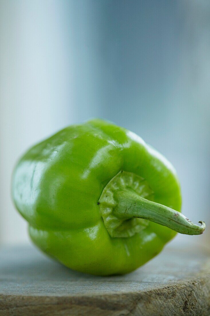 A closeup photo of green bell pepper with tip
