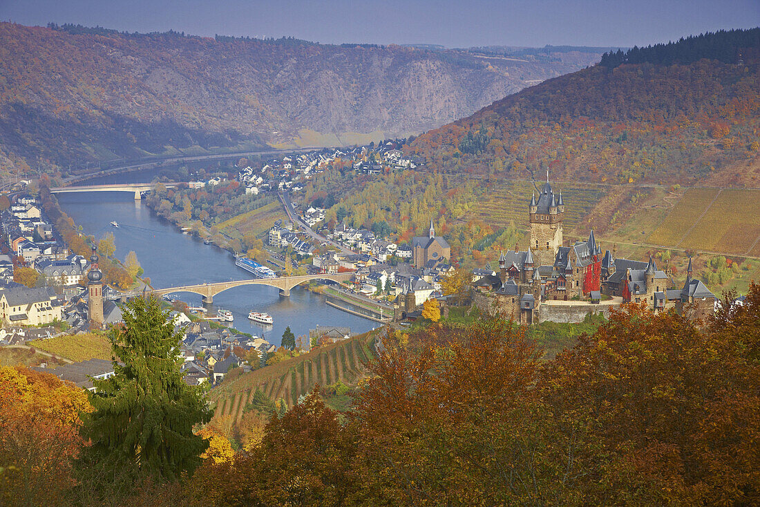 View at the Reichsburg (castle) (built about 1100 under Pfalzgraf Ezzo) and Cochem, Mosel, Rhineland-Palatinate, Germany, Europe